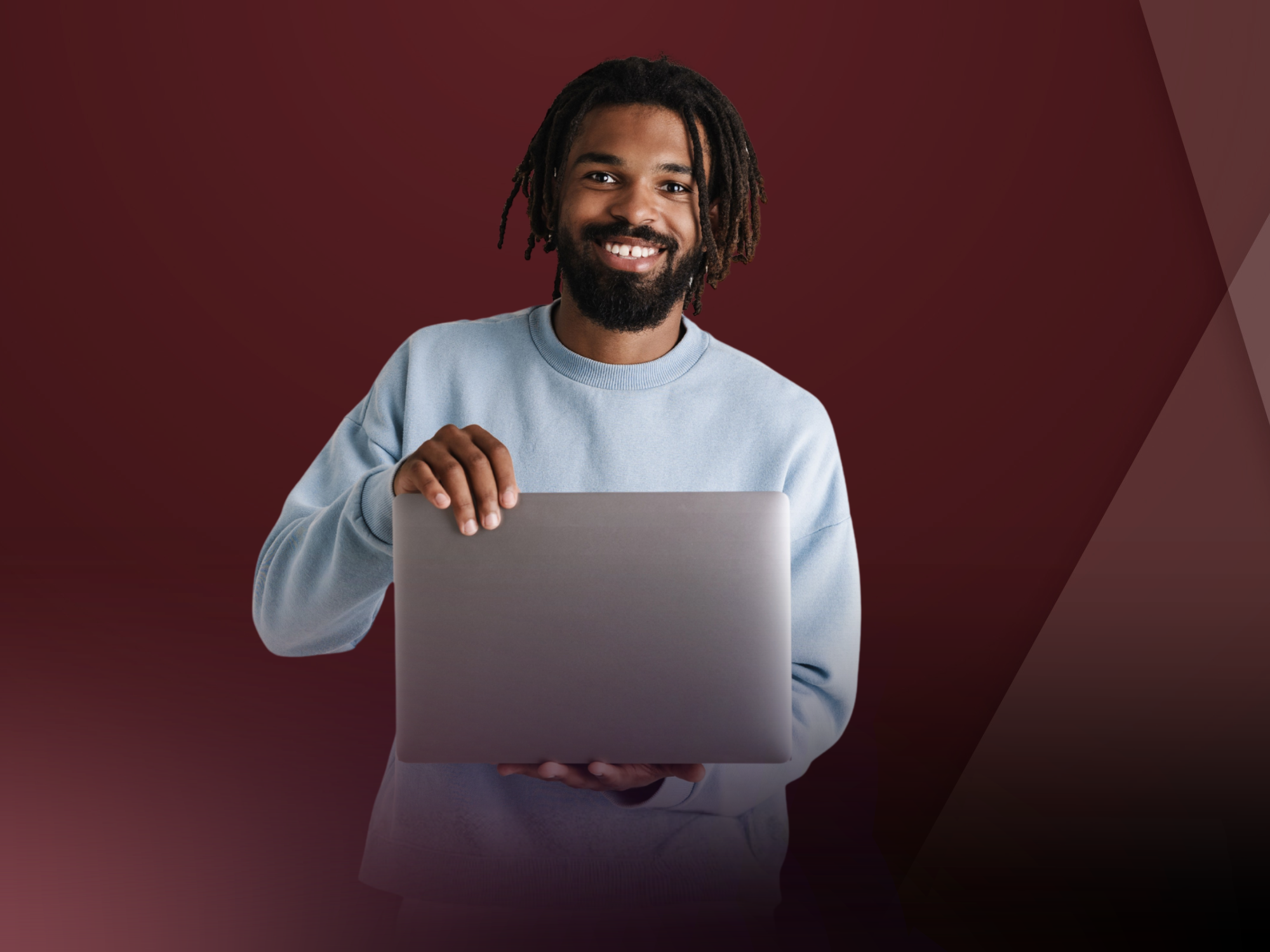 Person holding laptop