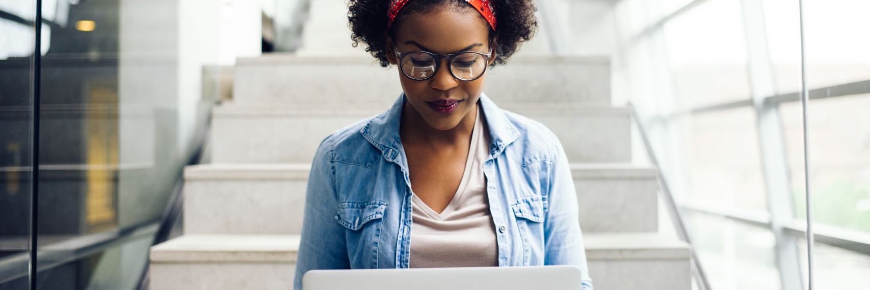 Image of young lady on computer